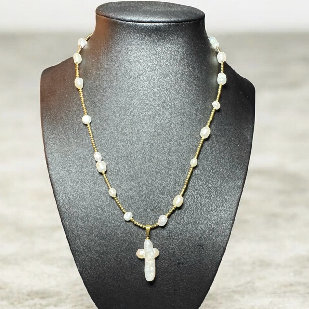 OSHENA Elegant Gold and White Pearl
Necklace with Cross Pendant